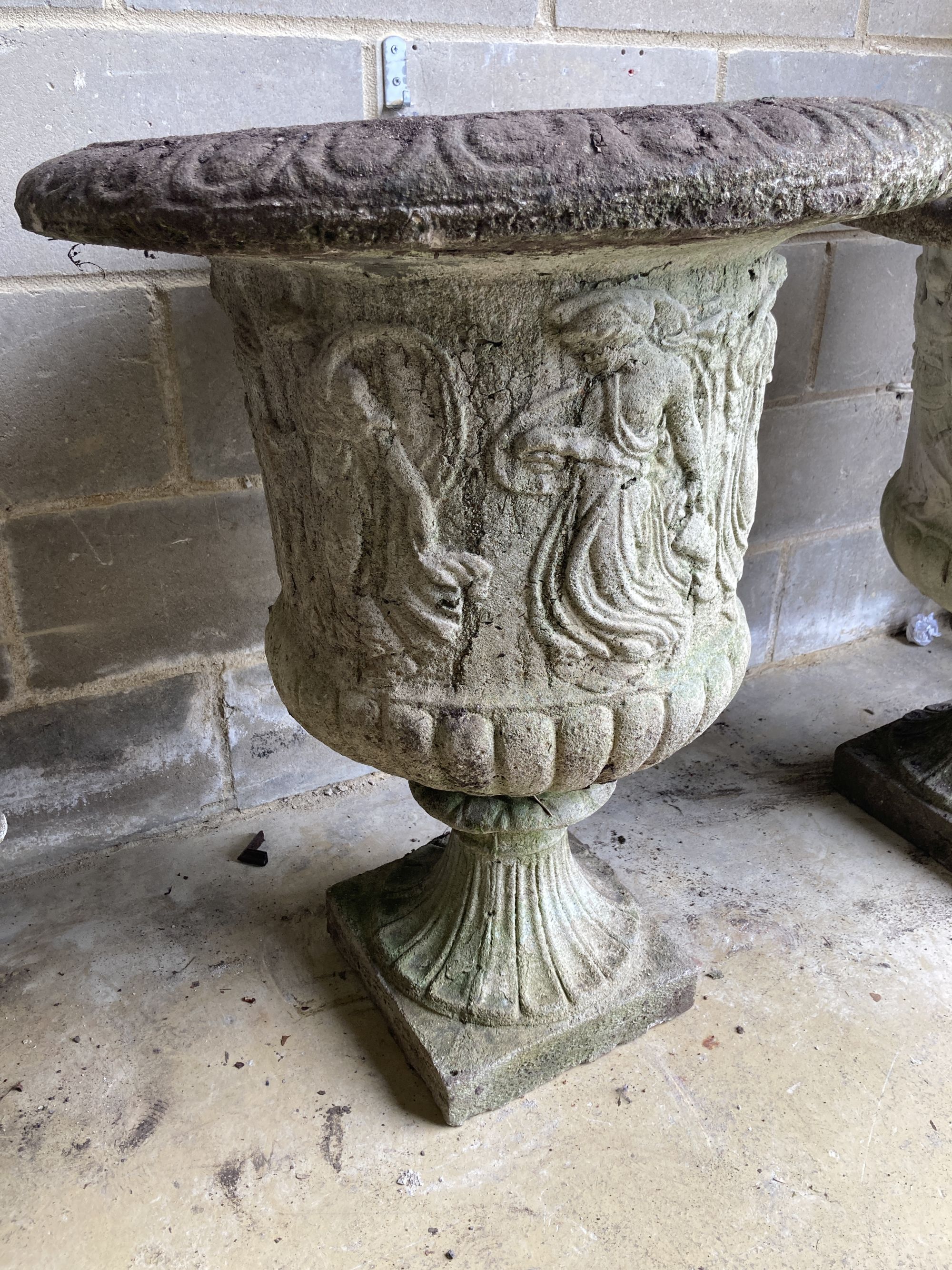 A near pair of reconstituted stone campana garden urns, larger 66cm diameter, height 85cm